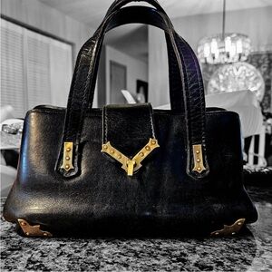 Vintage & Rare black SABER genuine leather handbag, circa late 1950s-early 1960